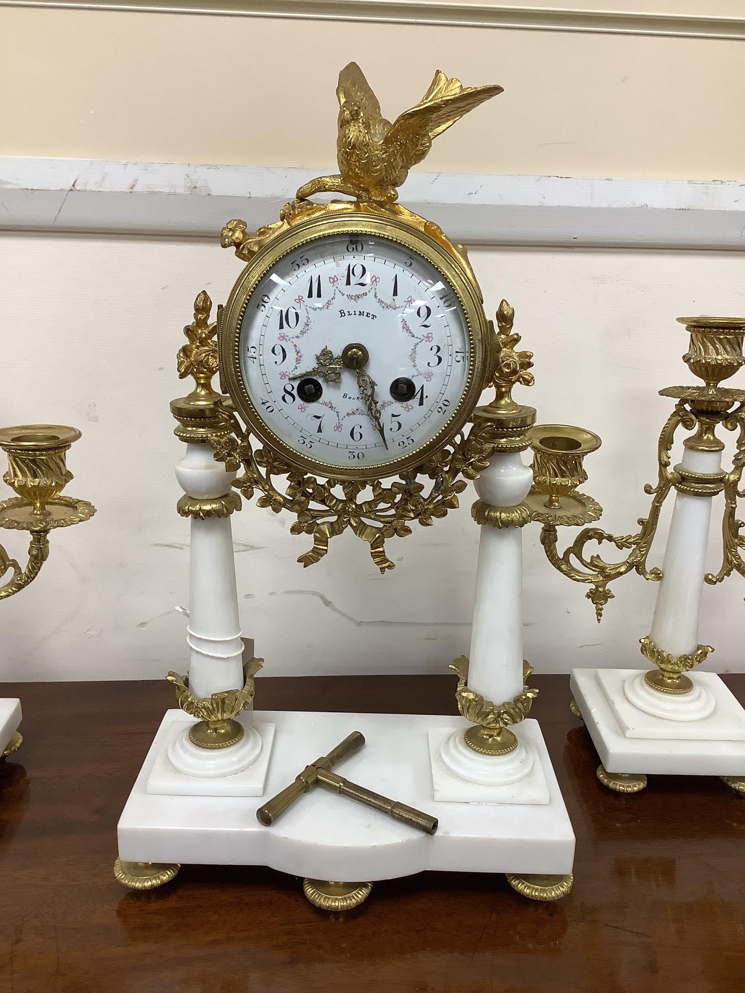 A French white marble and ormolu clock garniture, c.1900, no pendulum